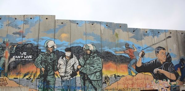 From Piece-Making to Peacemaking: The Influence of West Bank Barrier Graffiti Art